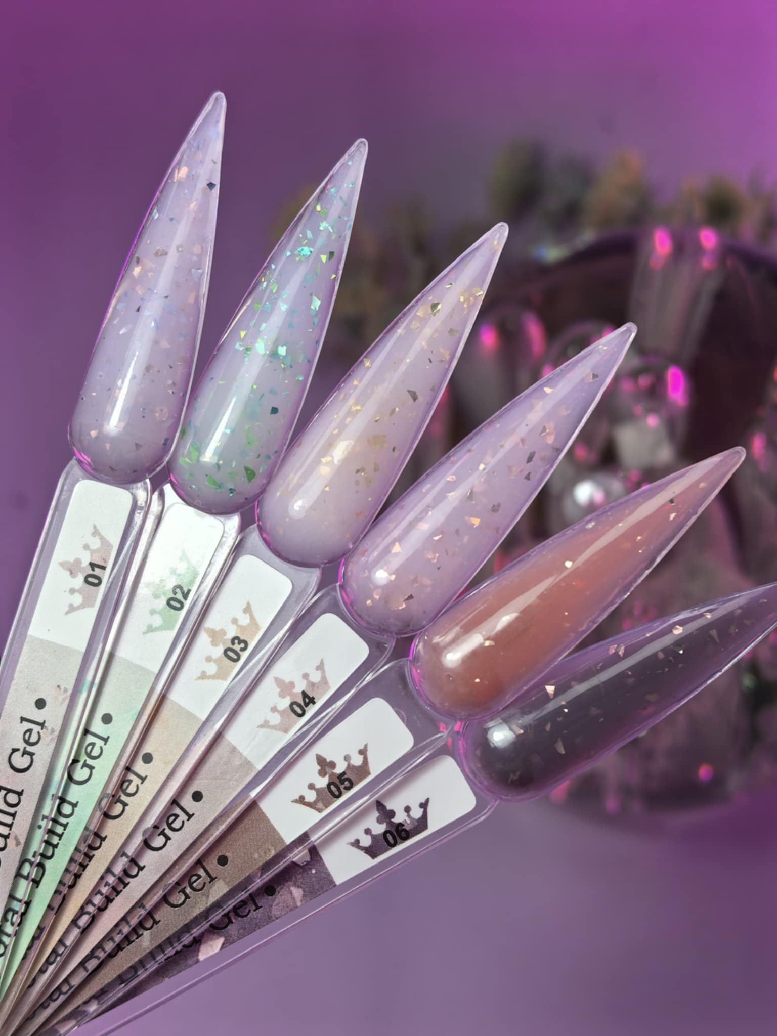 Potal Builder Gel 04 swatch display showing six colors with potal particles on acrylic nails, perfect for versatile nail designs.